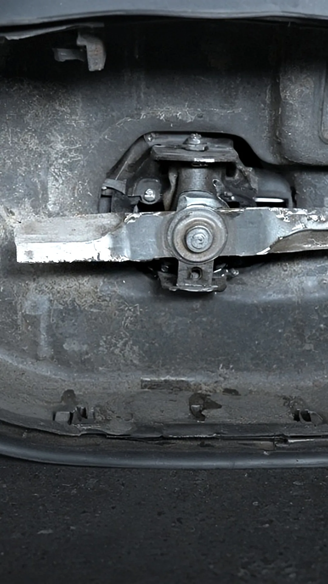The clean underside of a mower deck